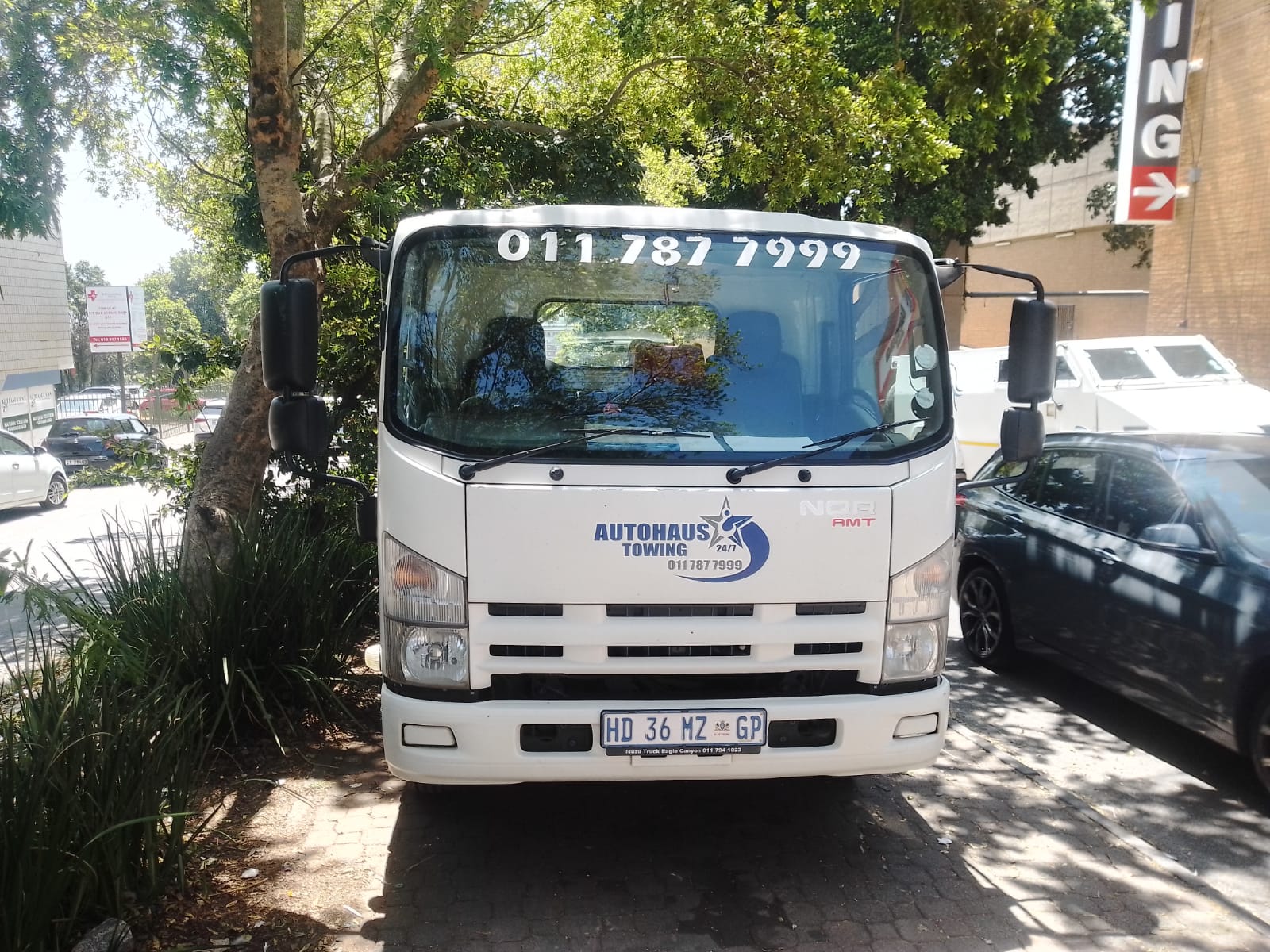 The Autohaus 4-ton Isuzu flatbed tow truck, ready for dispatch